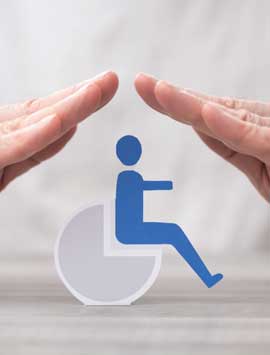 Professional reviewing disability insurance policy for income protection with an advisor